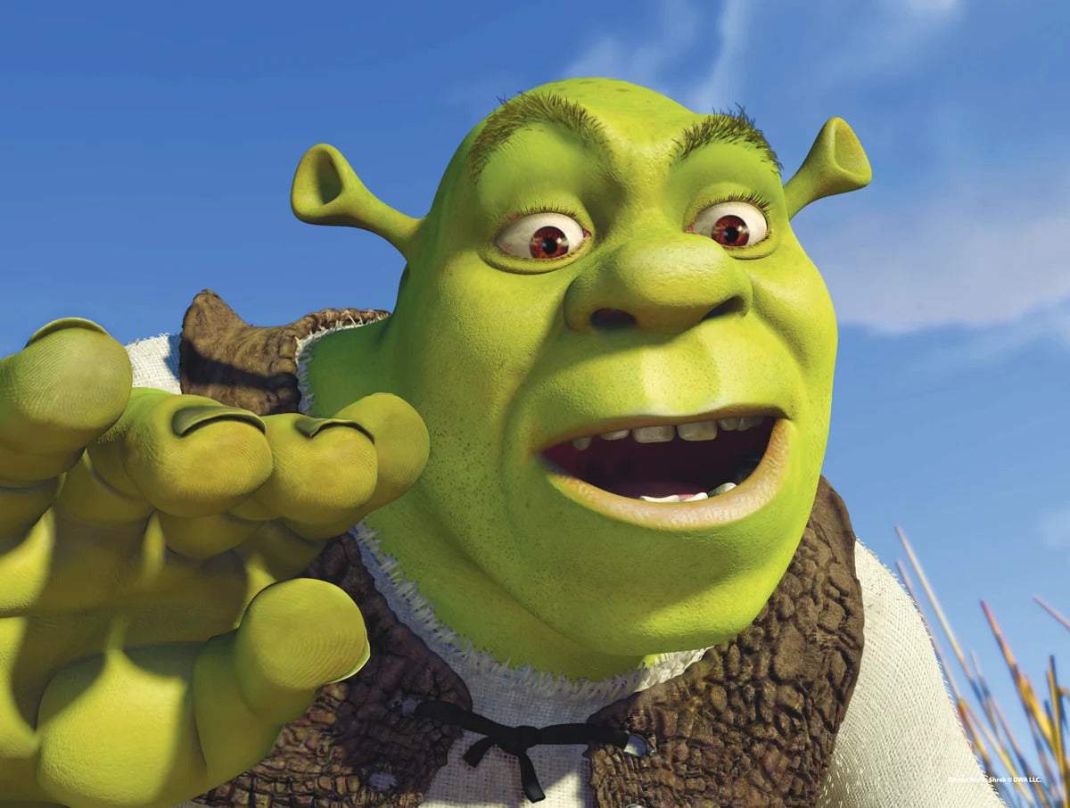 A closeup scene of Shrek from the first Shrek film, where Shrek has his mouth open, eyes wide, and is gesturing with his hand.